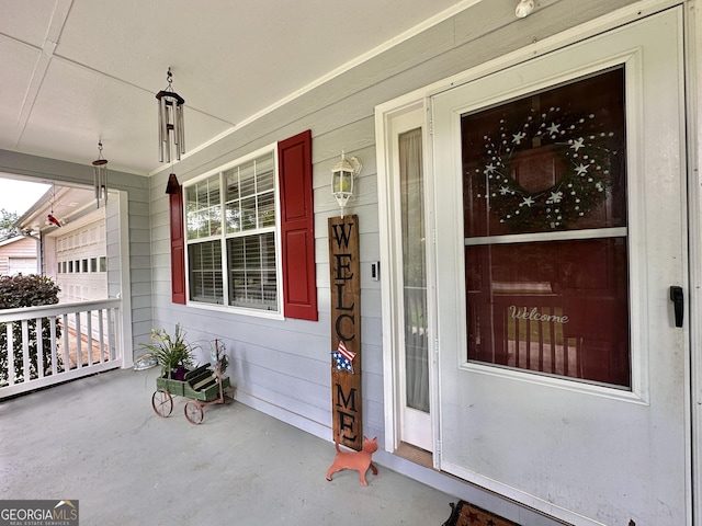 150 Willow Shoals Dr, Covington, GA 30016 - doorway to property with covered porch