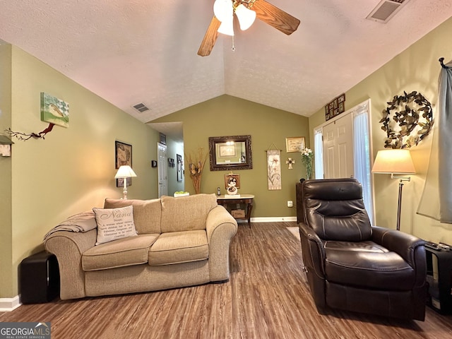 150 Willow Shoals Dr, Covington, GA 30016 - living area featuring wood finished floors, baseboards, vaulted ceiling, and ceiling fan