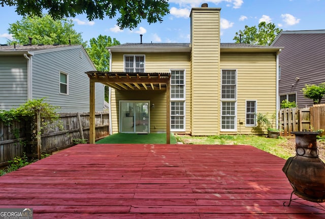 984 Wenham Ln, Lawrenceville, GA 30044 - wooden deck with a pergola and a fenced backyard