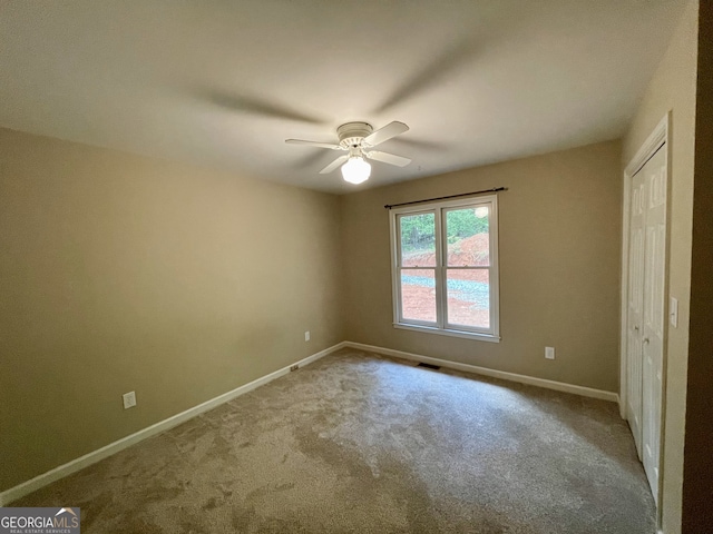 555 Barker Trail Rd, Cleveland, GA 30528 - unfurnished bedroom featuring carpet floors, baseboards, a closet, and ceiling fan