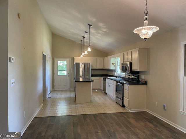 555 Barker Trail Rd, Cleveland, GA 30528 - kitchen featuring appliances with stainless steel finishes, a sink, a kitchen island, wood finished floors, and dark countertops