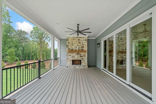 615 Claxton Ln, Milton, GA 30004 - wooden deck with an outdoor stone fireplace and a ceiling fan