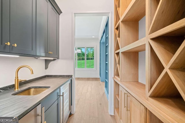 615 Claxton Ln, Milton, GA 30004 - kitchen featuring light wood-type flooring and gray cabinets