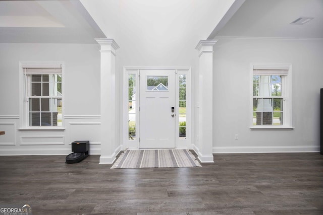 9929 Long Leaf Pine Dr, Midland, GA 31820 - foyer entrance featuring decorative columns, wood finished floors, crown molding, and baseboards