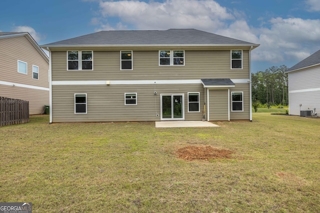 9929 Long Leaf Pine Dr, Midland, GA 31820 - back of property featuring a patio, a yard, and central air condition unit
