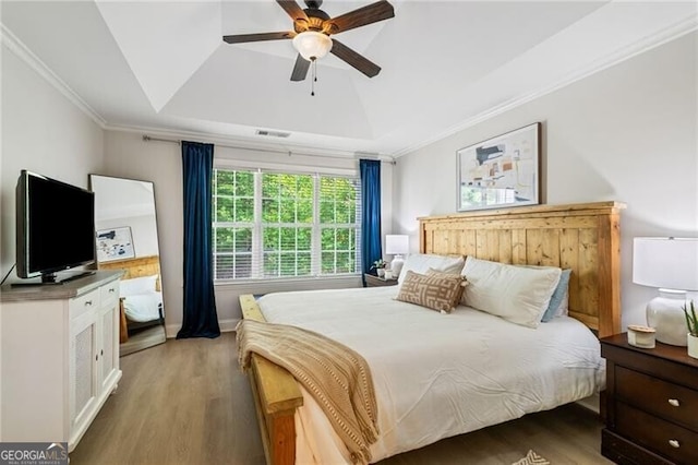 3088 Steeplechase Dr, Alpharetta, GA 30004 - bedroom featuring light wood-style floors, ornamental molding, a tray ceiling, and ceiling fan