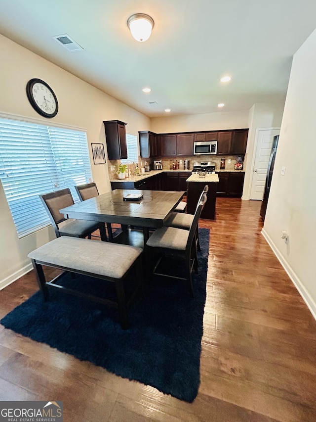 5848 Rex Ridge Loop, Rex, GA 30273 - dining area featuring baseboards, dark wood-style flooring, and recessed lighting