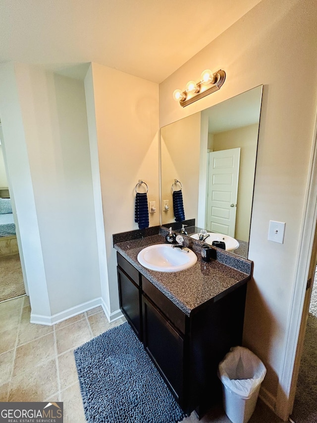 5848 Rex Ridge Loop, Rex, GA 30273 - bathroom with vanity and baseboards