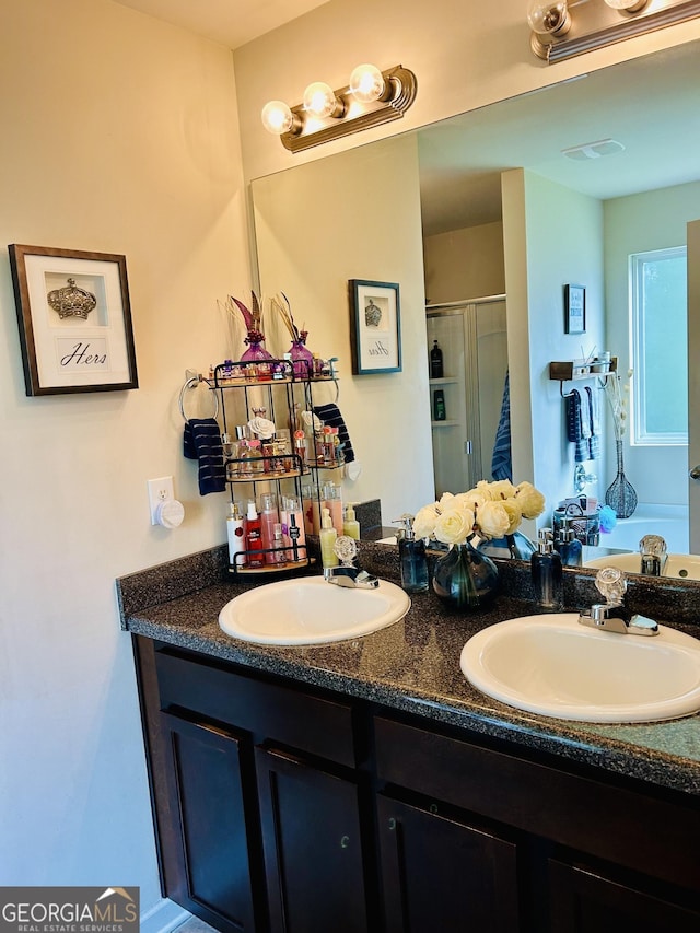 5848 Rex Ridge Loop, Rex, GA 30273 - bathroom featuring double vanity and a stall shower