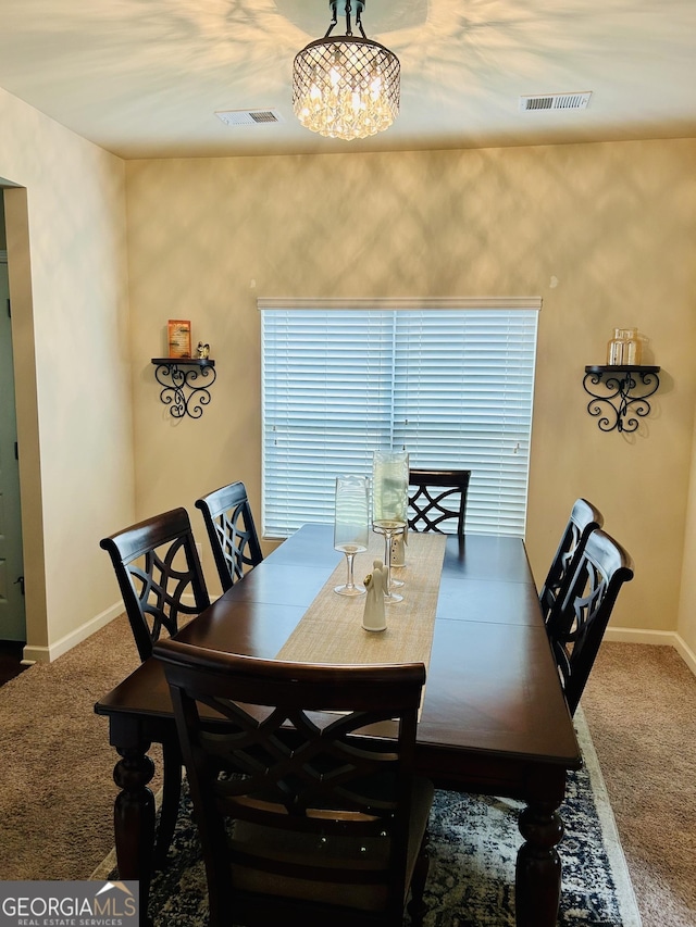 5848 Rex Ridge Loop, Rex, GA 30273 - carpeted dining area featuring baseboards and a chandelier