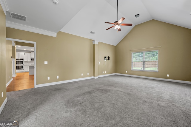 108 Donovan Ave, Locust Grove, GA 30248 - unfurnished room with carpet flooring, a ceiling fan, baseboards, ornamental molding, and high vaulted ceiling
