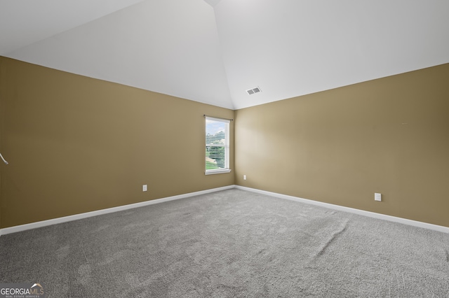 108 Donovan Ave, Locust Grove, GA 30248 - unfurnished room featuring high vaulted ceiling, baseboards, and carpet flooring