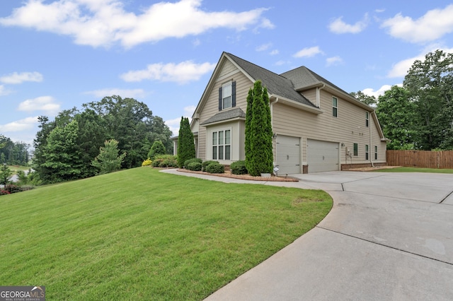 108 Donovan Ave, Locust Grove, GA 30248 - view of property exterior featuring driveway, an attached garage, and a shingled roof