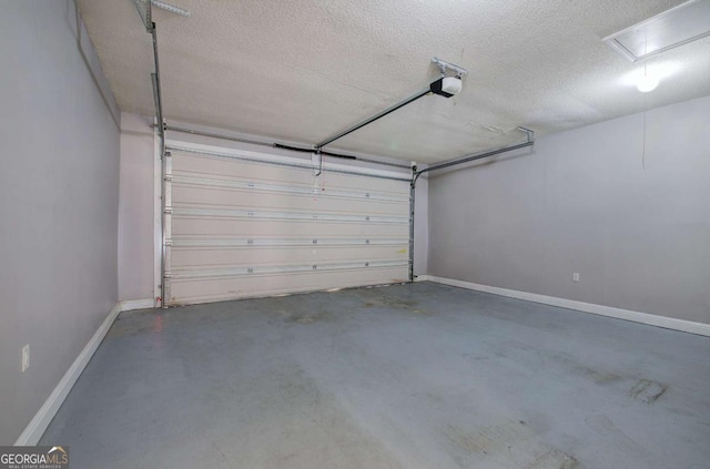 2500 Rosehill Cir, Lithia Springs, GA 30122 - garage with baseboards and a garage door opener