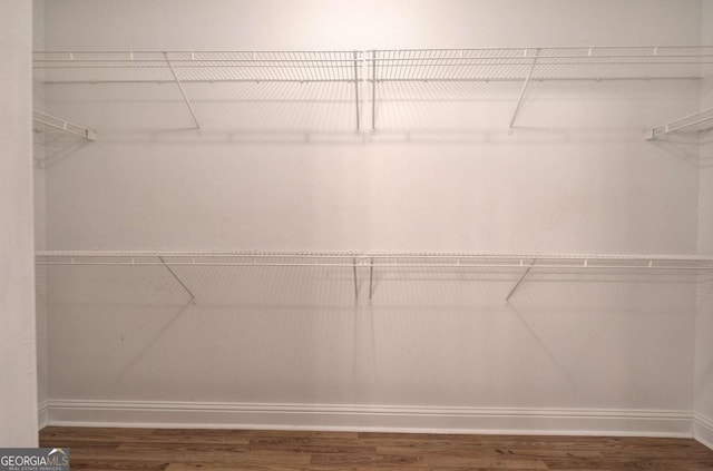 2500 Rosehill Cir, Lithia Springs, GA 30122 - walk in closet featuring wood finished floors