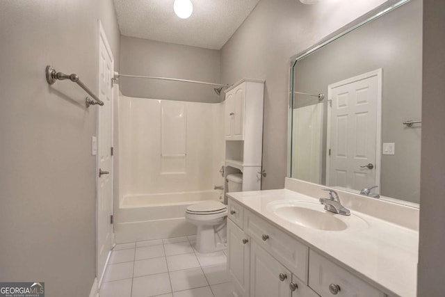 2500 Rosehill Cir, Lithia Springs, GA 30122 - bathroom with tile patterned floors, vanity, a textured ceiling, and shower / tub combination