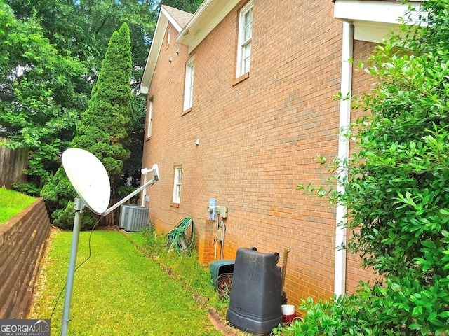 3332 Glenrose Trl, Chamblee, GA 30341 - view of home's exterior featuring a central air condition unit and brick siding