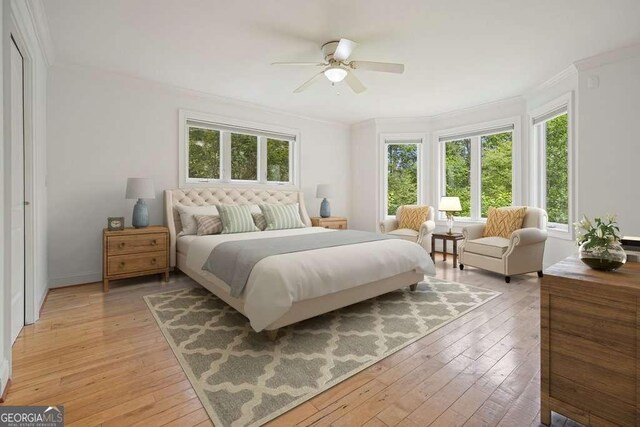 326 Seldom Seen Trl, Canton, GA 30115 - bedroom featuring ornamental molding, light wood-style floors, and ceiling fan