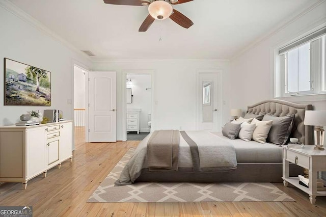 326 Seldom Seen Trl, Canton, GA 30115 - bedroom featuring ornamental molding, light wood-style floors, connected bathroom, and a ceiling fan