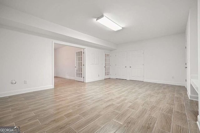 326 Seldom Seen Trl, Canton, GA 30115 - spare room featuring light wood-style floors and french doors