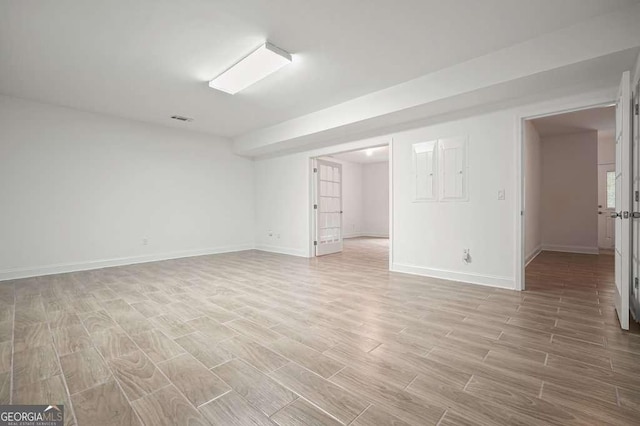326 Seldom Seen Trl, Canton, GA 30115 - unfurnished room with light wood-style floors and baseboards