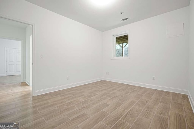 326 Seldom Seen Trl, Canton, GA 30115 - unfurnished room featuring light wood finished floors and baseboards