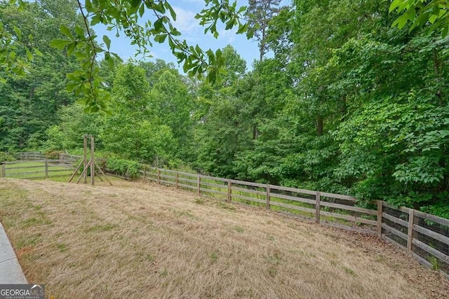 326 Seldom Seen Trl, Canton, GA 30115 - view of yard with a forest view