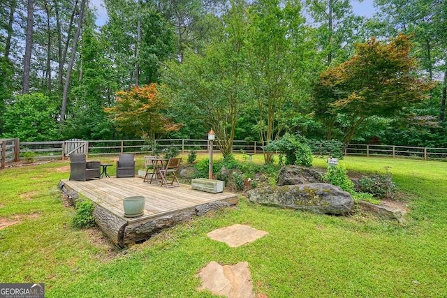326 Seldom Seen Trl, Canton, GA 30115 - fenced backyard featuring a wooden deck