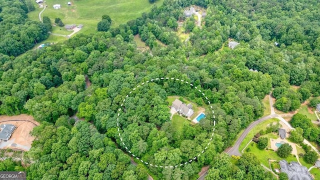 326 Seldom Seen Trl, Canton, GA 30115 - aerial view of property and surrounding area featuring a heavily wooded area