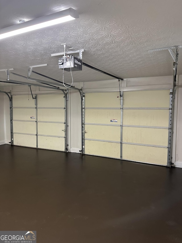 140 Clover Valley Dr, Covington, GA 30016 - garage featuring a garage door opener