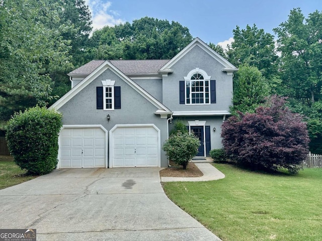 230 Wytheford Ct, Alpharetta, GA 30004 - traditional home with a front yard, a garage, concrete driveway, and stucco siding