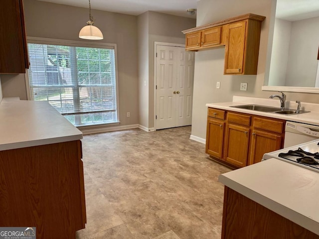 230 Wytheford Ct, Alpharetta, GA 30004 - kitchen featuring a sink, white dishwasher, light countertops, and brown cabinets