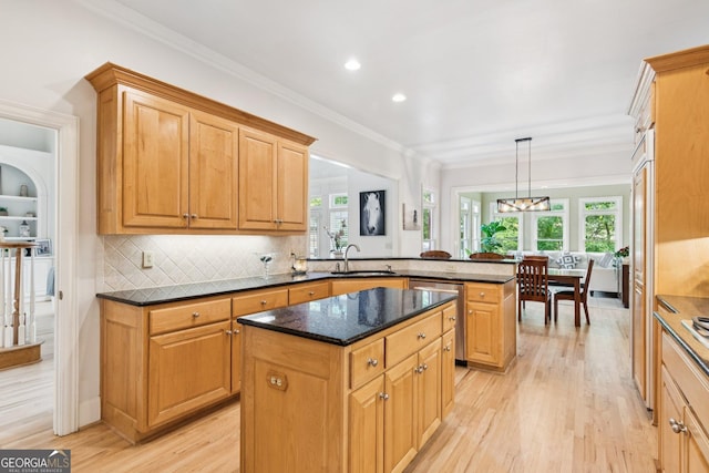 952 Moores Walk Ln, Suwanee, GA 30024 - kitchen with a sink, a peninsula, dishwasher, light wood-style floors, and a center island