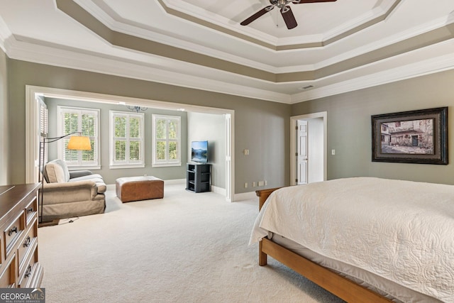 952 Moores Walk Ln, Suwanee, GA 30024 - bedroom with ornamental molding, a tray ceiling, carpet, and a ceiling fan