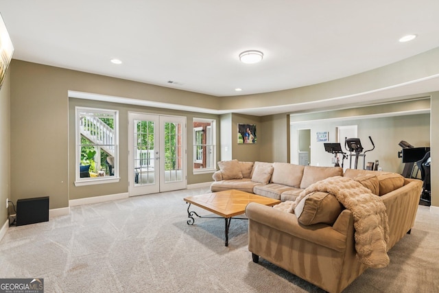 952 Moores Walk Ln, Suwanee, GA 30024 - living area featuring light colored carpet, baseboards, recessed lighting, and french doors