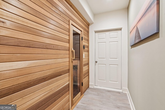 952 Moores Walk Ln, Suwanee, GA 30024 - corridor featuring light wood-type flooring, a relaxing sauna, and baseboards