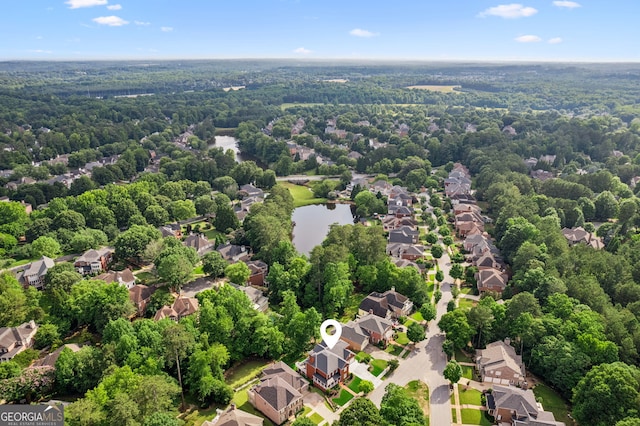952 Moores Walk Ln, Suwanee, GA 30024 - aerial perspective of suburban area featuring a large body of water and a heavily wooded area