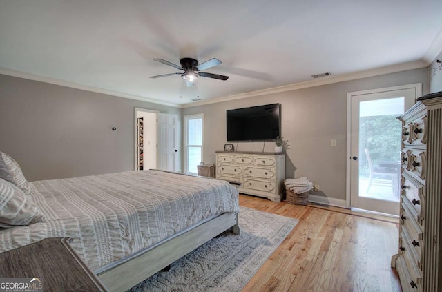 6095 Fords Rd NW, Acworth, GA 30101 - bedroom featuring access to exterior, ornamental molding, wood finished floors, baseboards, and ceiling fan