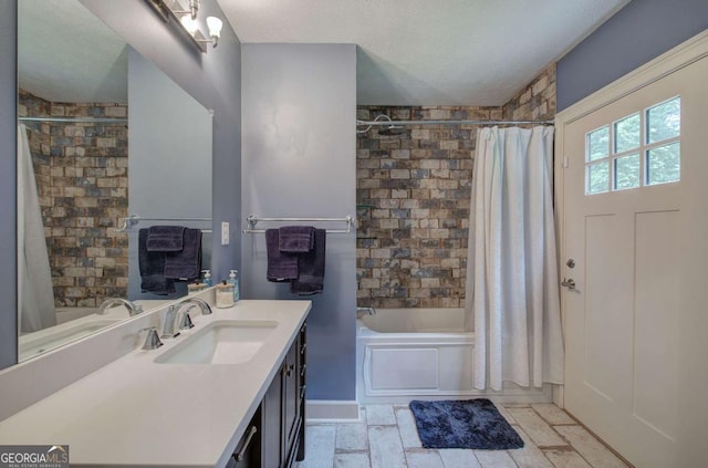 6095 Fords Rd NW, Acworth, GA 30101 - bathroom with shower / bath combo, vanity, and a textured ceiling