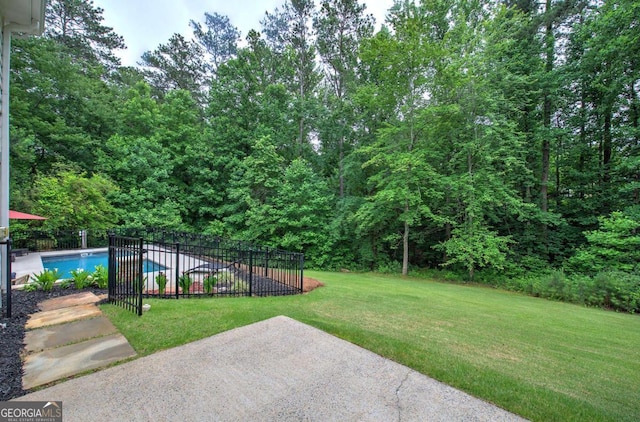 6095 Fords Rd NW, Acworth, GA 30101 - view of yard featuring a patio and a view of trees