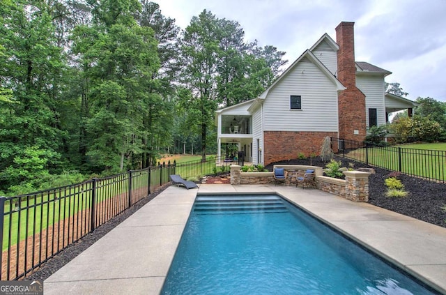 6095 Fords Rd NW, Acworth, GA 30101 - view of swimming pool featuring a patio area and a fenced backyard