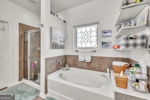 7891 Brass Lantern Dr, Flowery Branch, GA 30542 - full bath featuring a bath and a shower stall