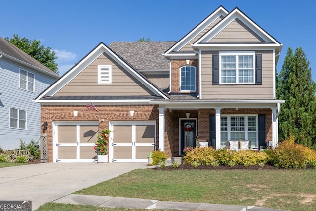 7891 Brass Lantern Dr, Flowery Branch, GA 30542 - view of front facade featuring brick siding, driveway, a front lawn, a standing seam roof, and a garage
