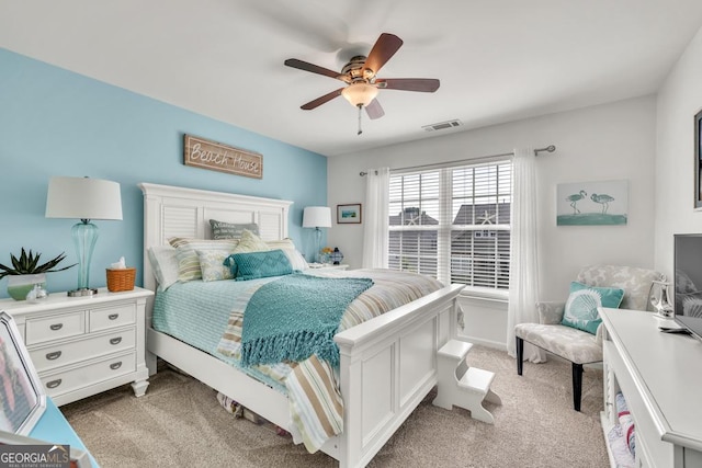 7891 Brass Lantern Dr, Flowery Branch, GA 30542 - bedroom featuring light colored carpet and a ceiling fan
