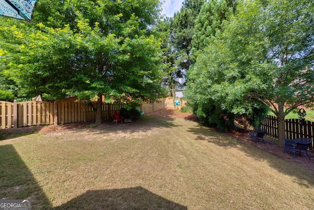 7891 Brass Lantern Dr, Flowery Branch, GA 30542 - view of fenced backyard