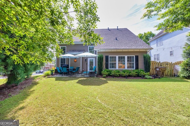 7891 Brass Lantern Dr, Flowery Branch, GA 30542 - rear view of property with a patio area and a shingled roof
