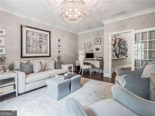 8957 Old Southwick Pass, Johns Creek, GA 30022 - living room featuring a desk, a chandelier, wood finished floors, baseboards, and crown molding