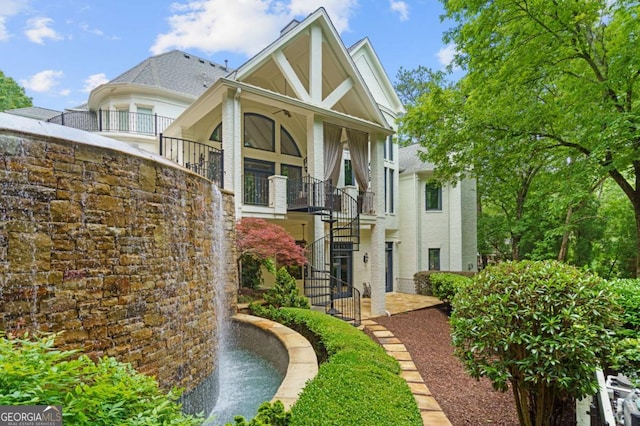 8957 Old Southwick Pass, Johns Creek, GA 30022 - view of front facade featuring stairs and stucco siding