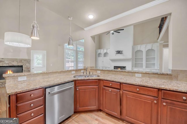 3451 Falls Branch Ct, Buford, GA 30519 - kitchen with a stone fireplace, dishwasher, open floor plan, a sink, and crown molding