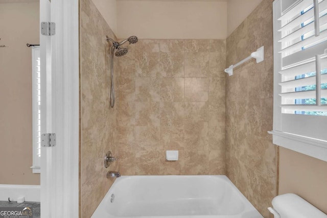 3451 Falls Branch Ct, Buford, GA 30519 - bathroom with bathtub / shower combination and toilet